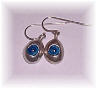 Silver earrings with blue enamel spirals