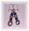 Silver earrings with blue glass beads