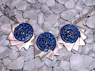 silver necklace with  blue enamel spirals enamel