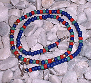 necklace with cast goid beads and glass beads