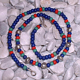 necklace with cast silver beads and glass beads