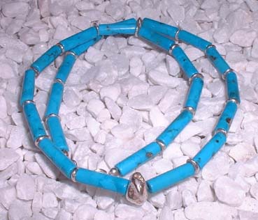 necklace with turquoise cylinder and silver beads